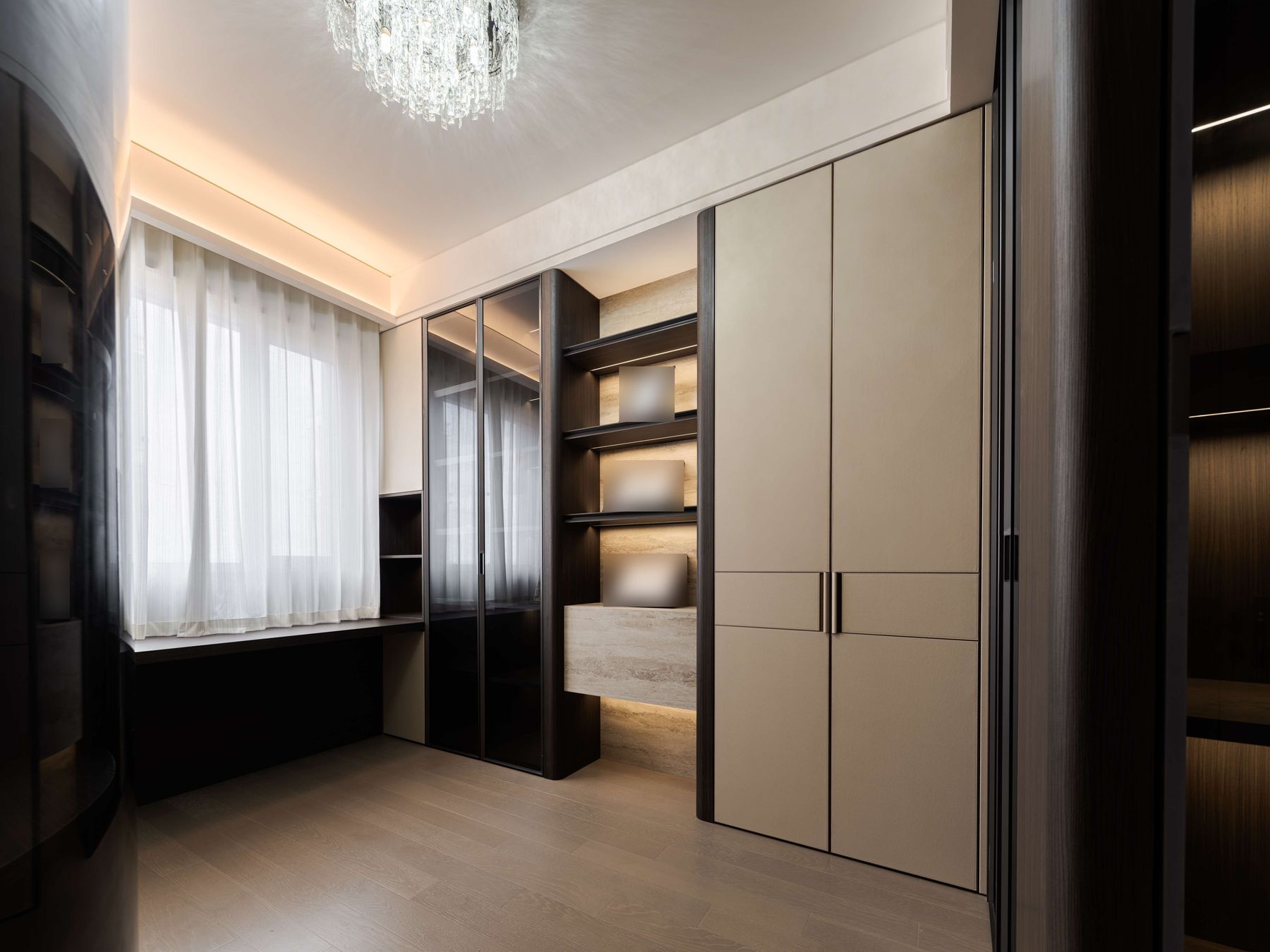 Study and dressing room with faux leather wardrobe doors, smoked glass doors and a lit display niche