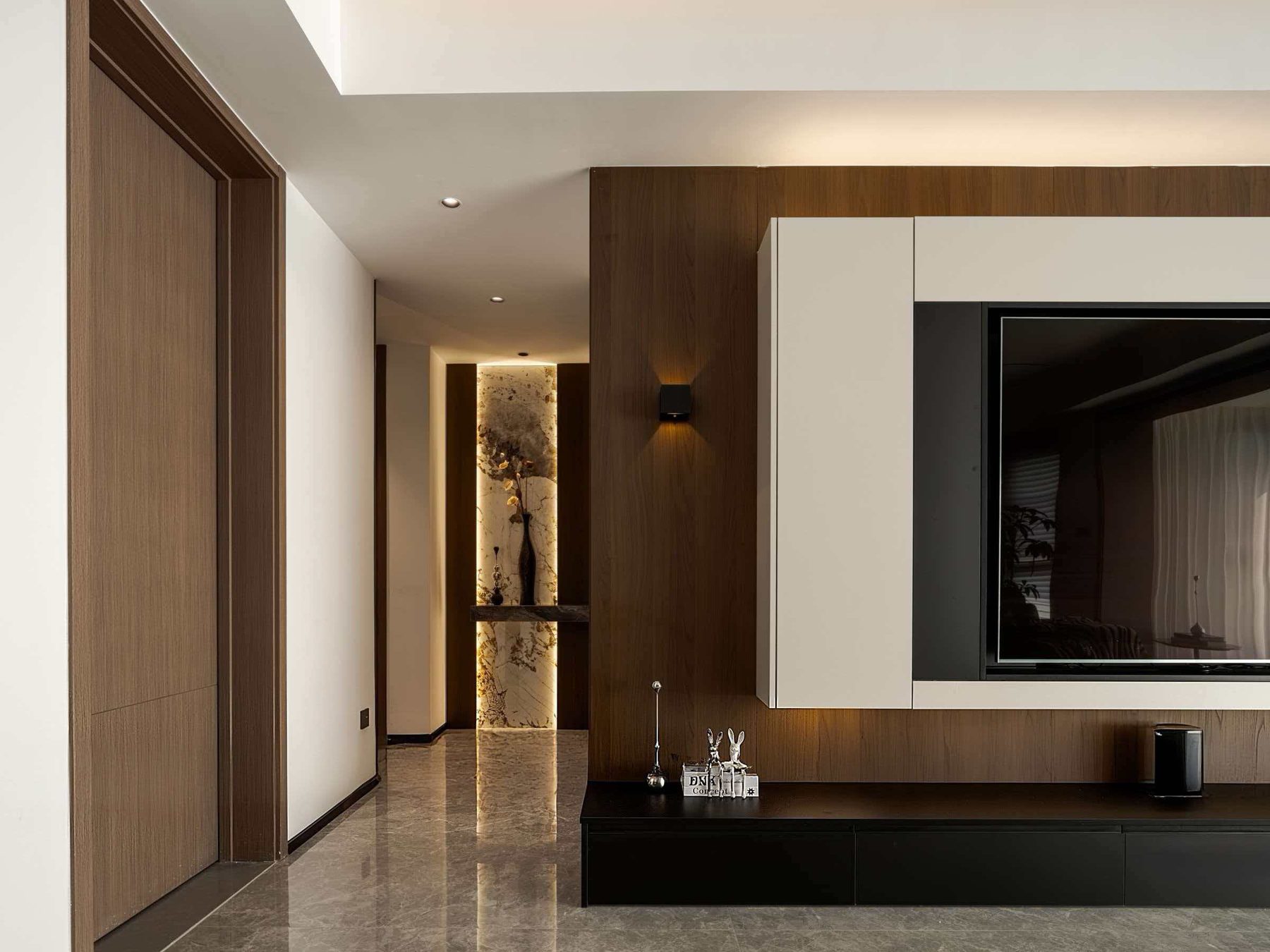 Entry hall with timber panelling and a white TV wall unit