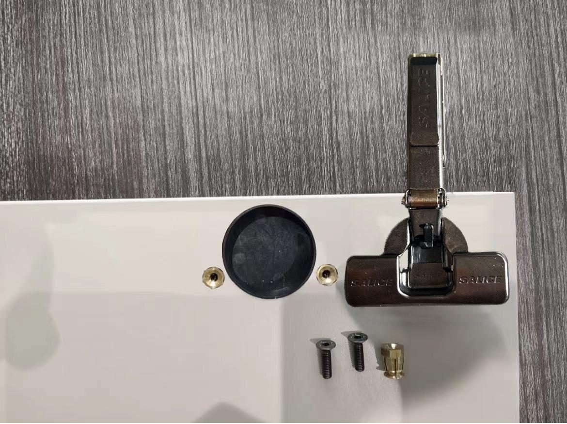 Cabinet hinge with brass threaded inserts