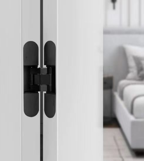 Concealed door hinge